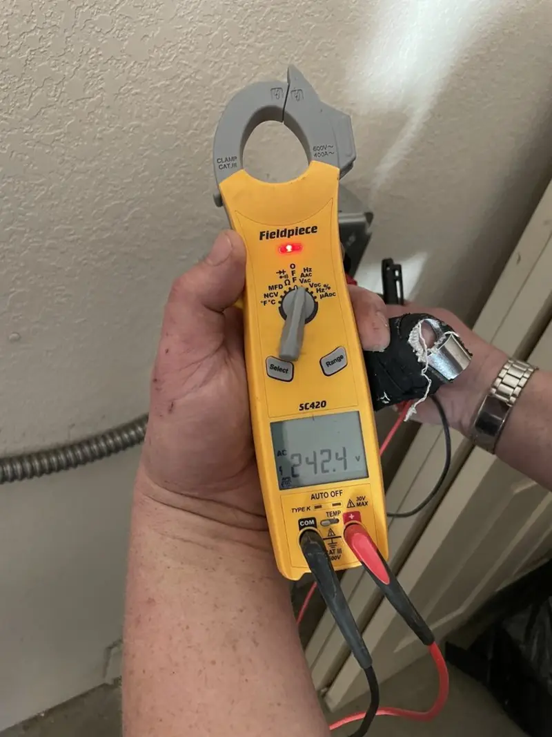 Voltage testing with clamp meter during Aluminum Wiring Replacement in Ypsilanti